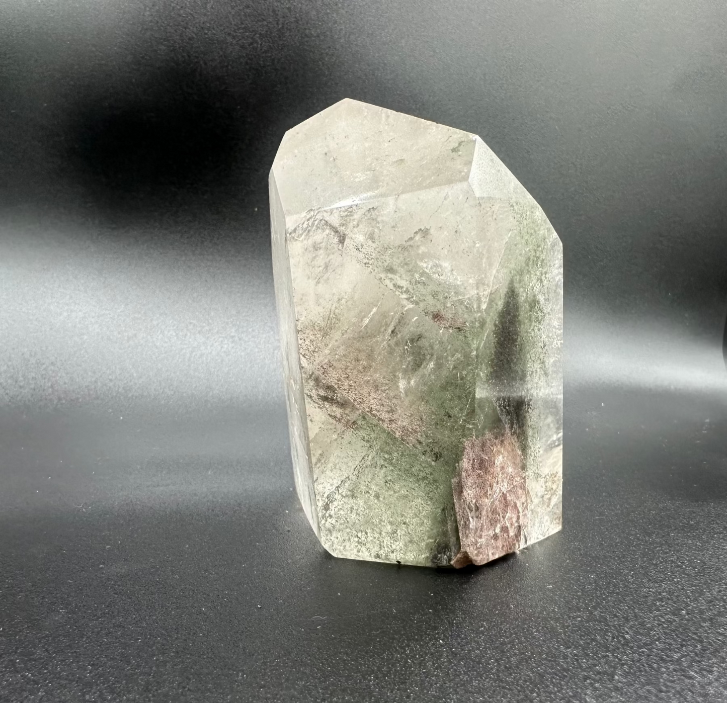 Side View Of Chlorite Quartz Point Showing The Green Chlorite Growths Within The Miner