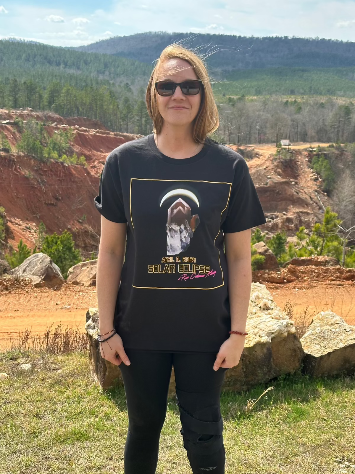 Woman wearing black t-shirt with graphics