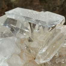 Load image into Gallery viewer, Close up of horizontal crystal point on a crystal cluster

