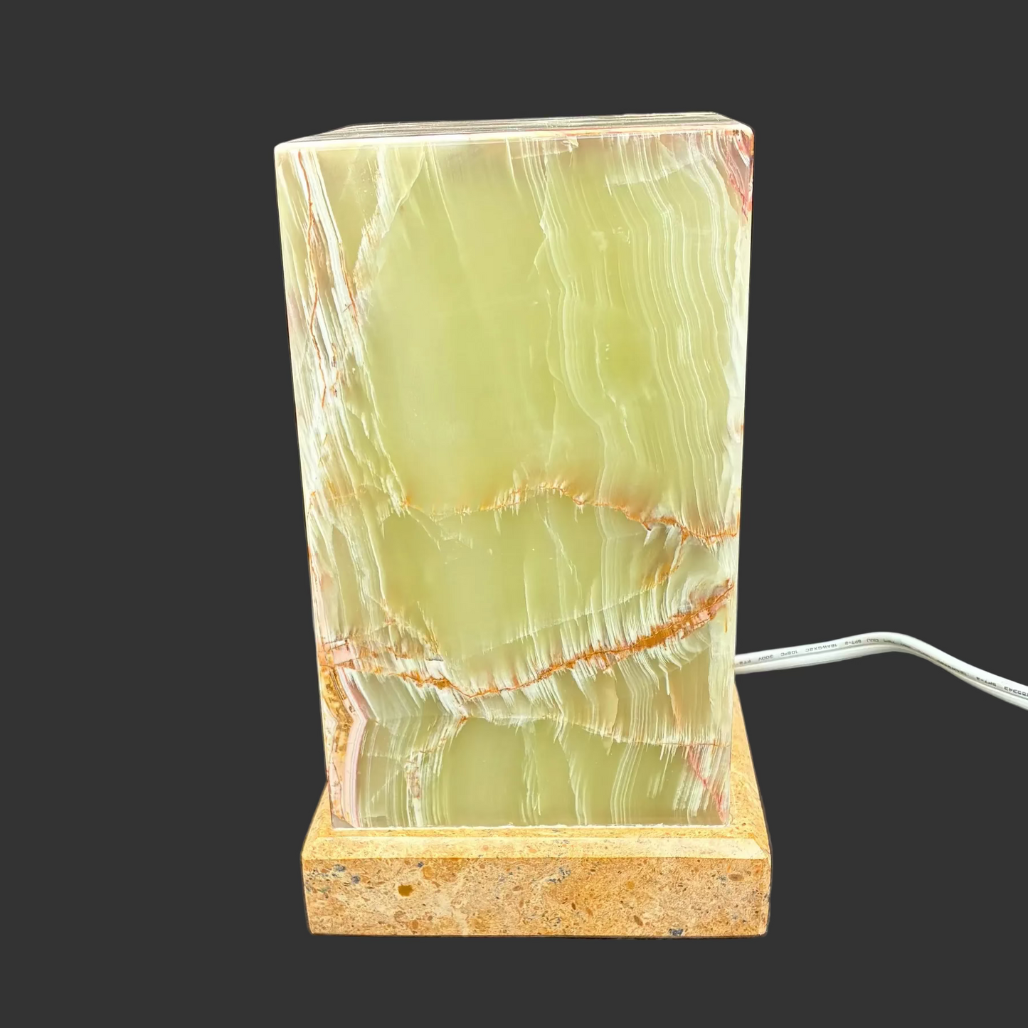 This is the front view of this banded onyx table lamp, with the light off.