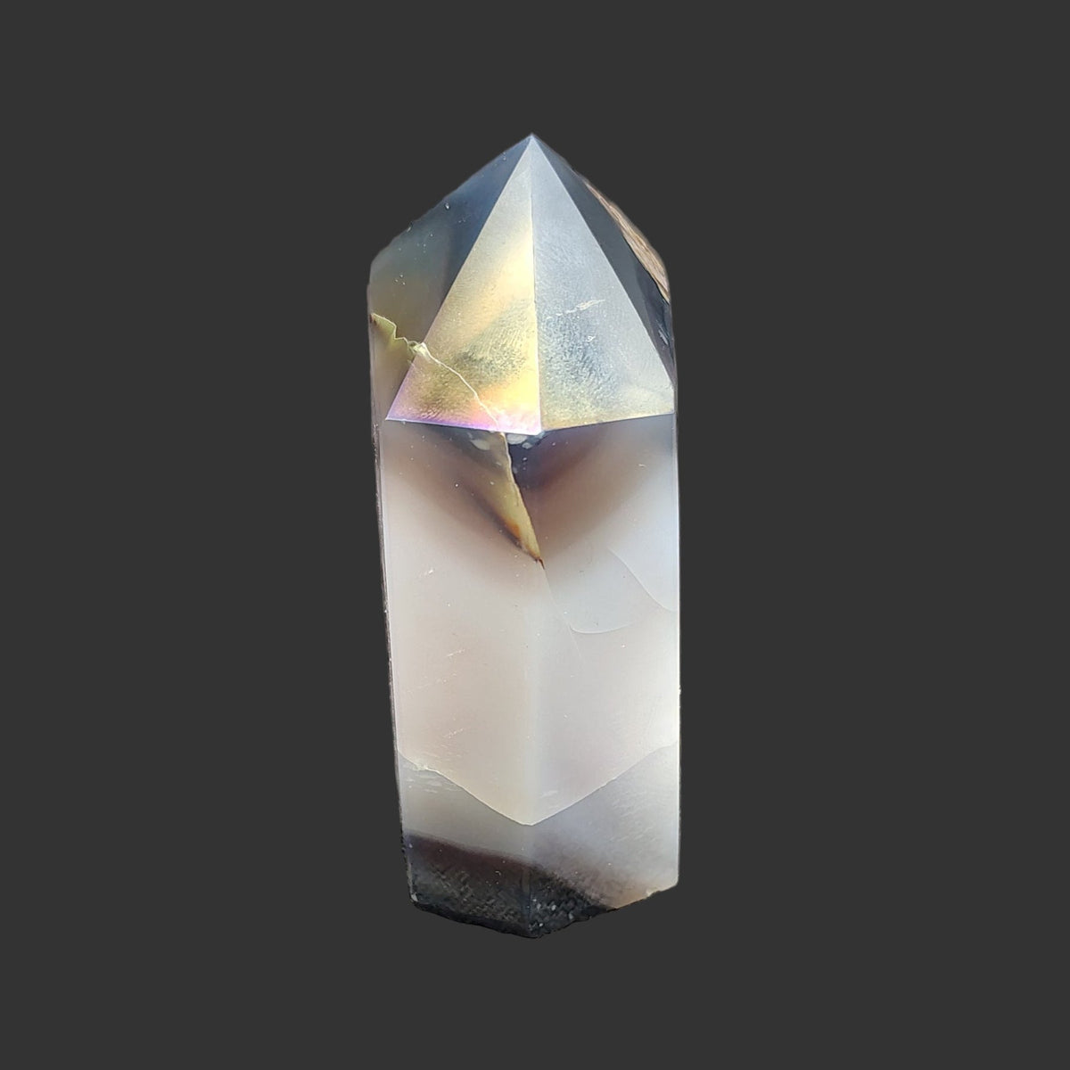 This is the left side of this aura coated crystal point.