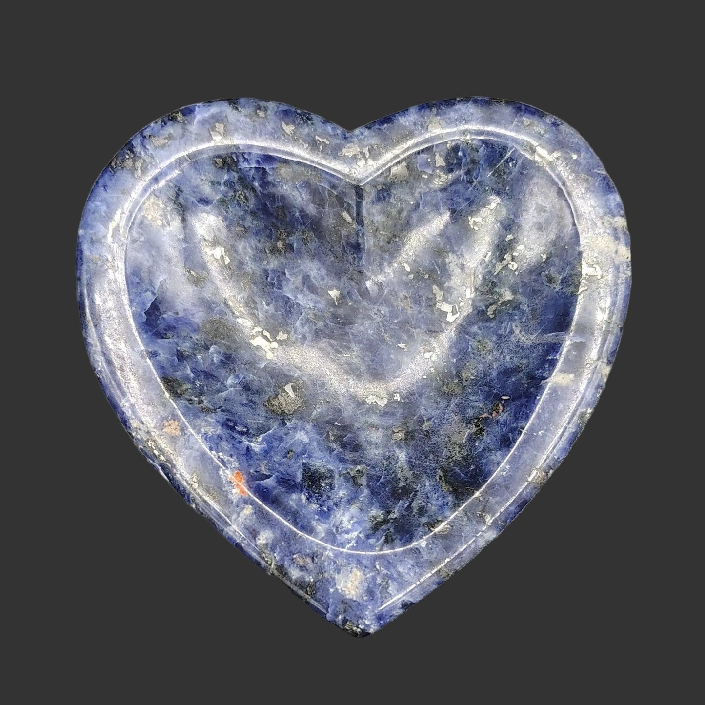 This is the top view of this hand-made polished blue sodalite heart trinket bowl.
