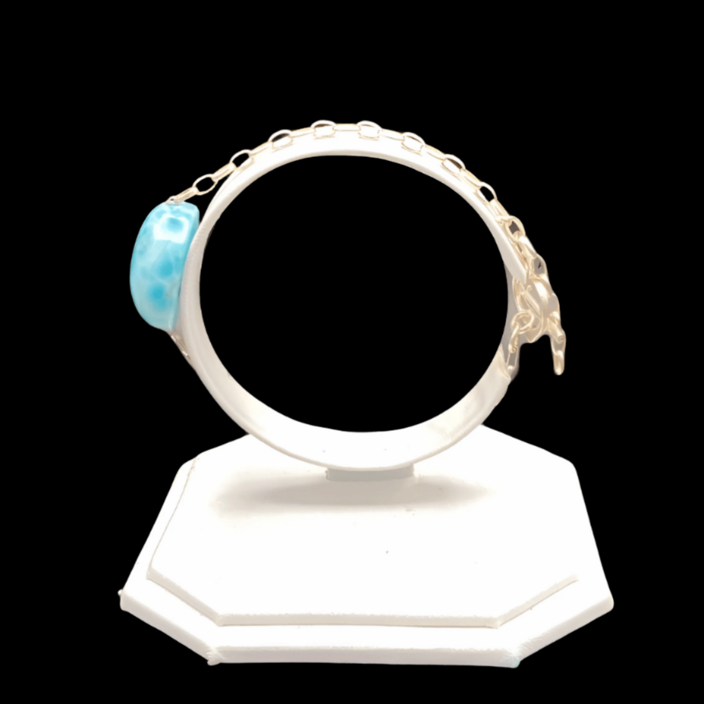 Side View of Larimar bracelet on a white display stand