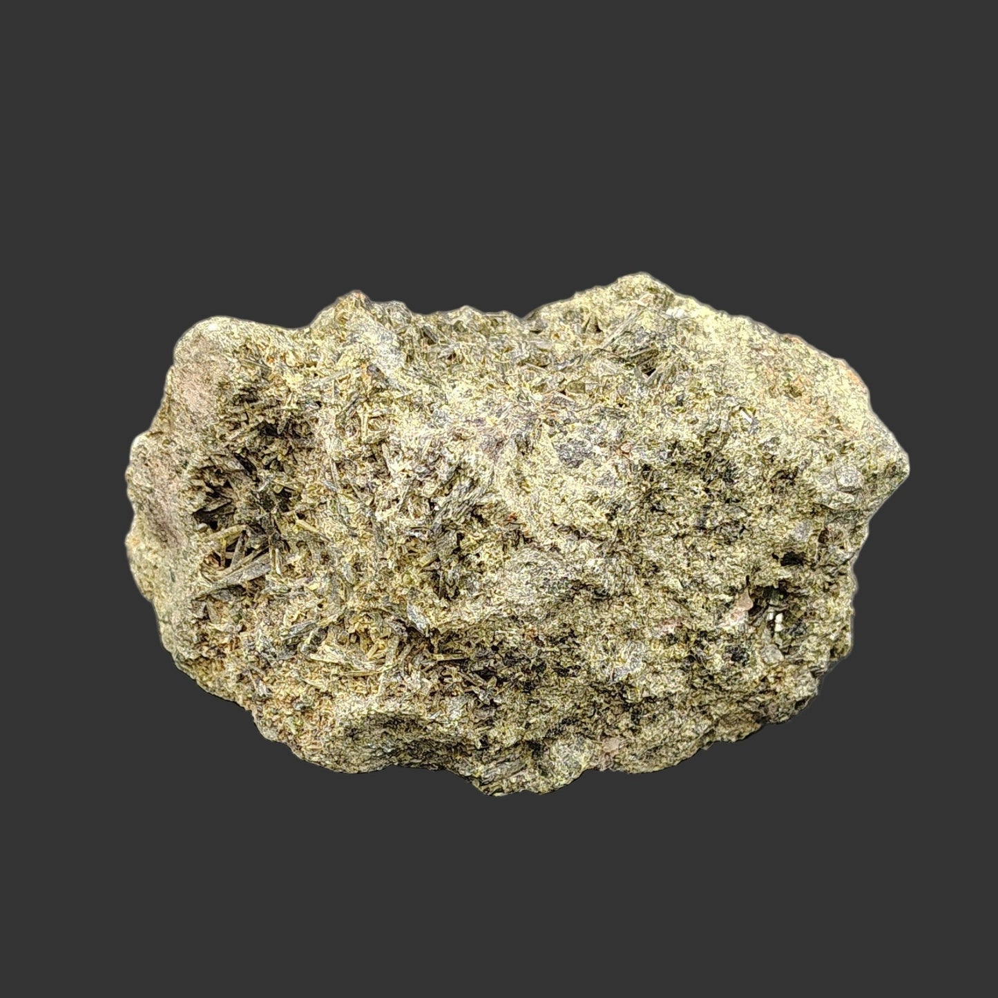 This is a close up of a piece of raw Epidote.