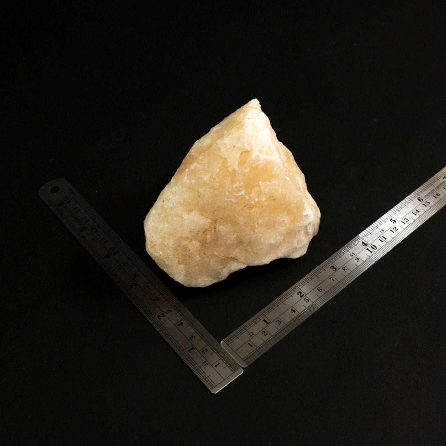 White Calcite Rock Two Metal Rulers