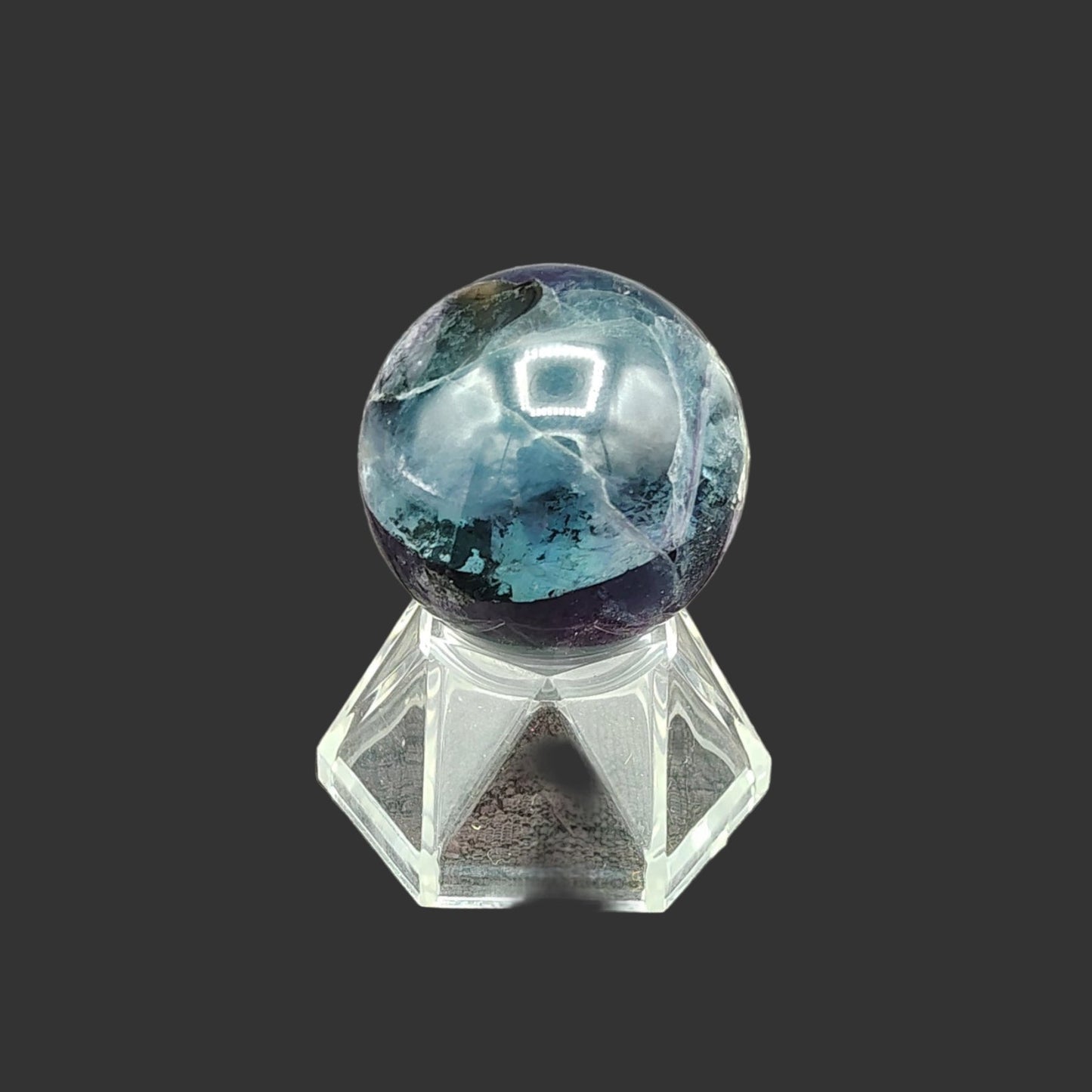 This is the right side of this polished fluorite sphere