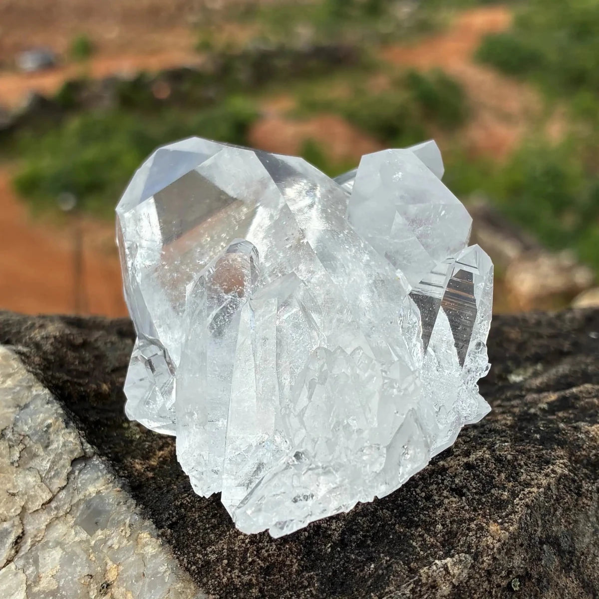 Right side of this double terminated Quartz crystal cluster outdoors.