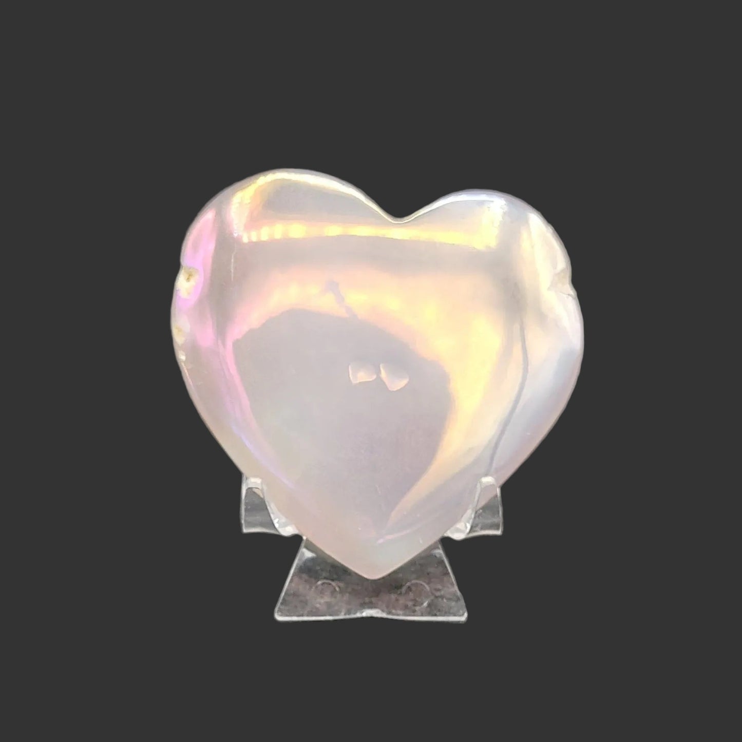 Back side of this iridescent drusy Agate rainbow polished heart.