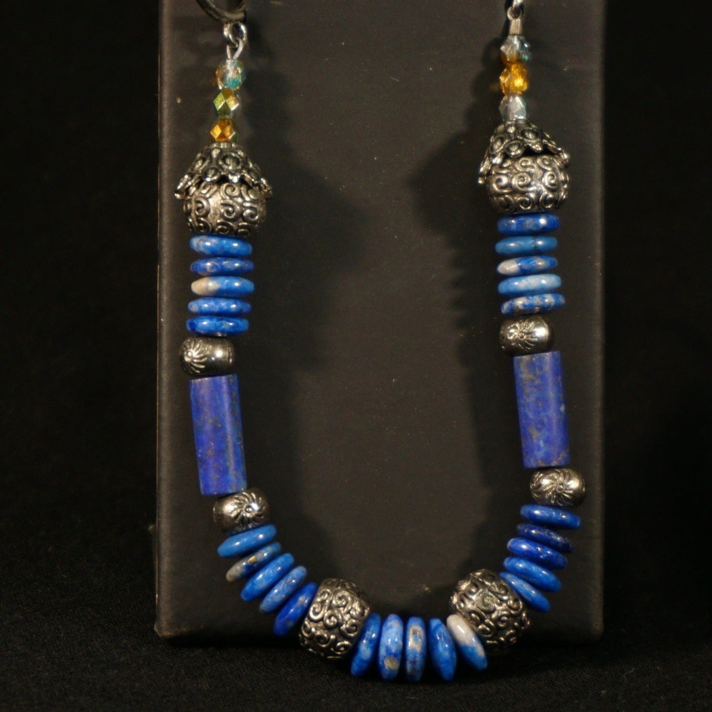 Lapis Bracelet on a black display stand