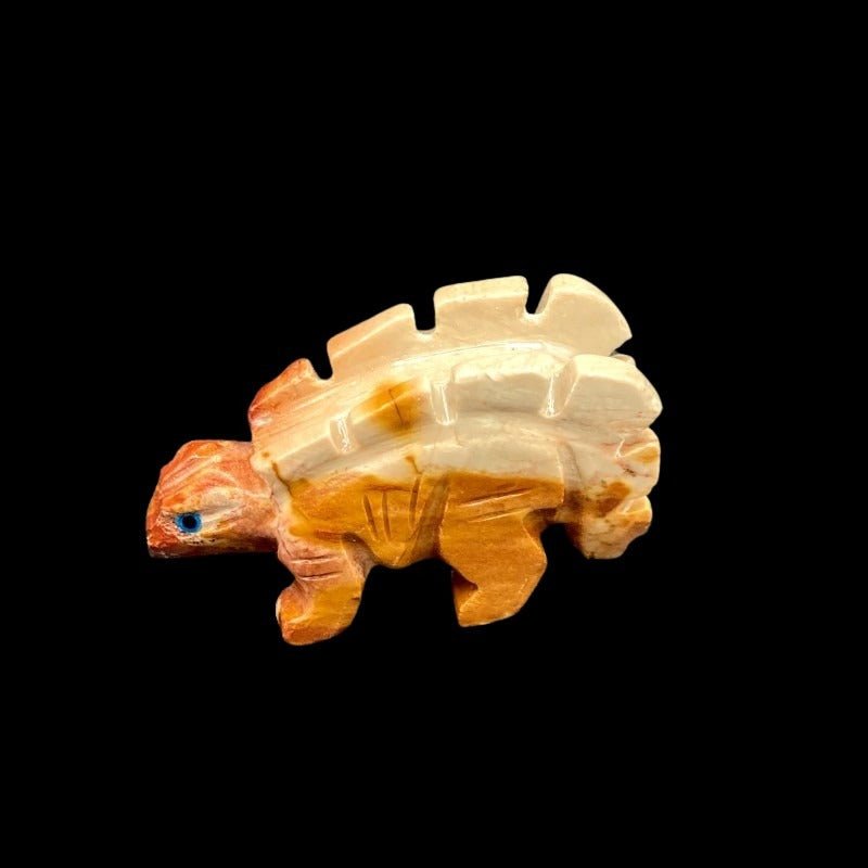Left Side Of Polished Stegosaurus Soapstone Figurine, Beige And Brown In Color