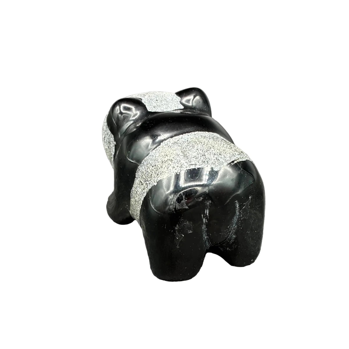 Back side of this obsidian panda in front of a white background.