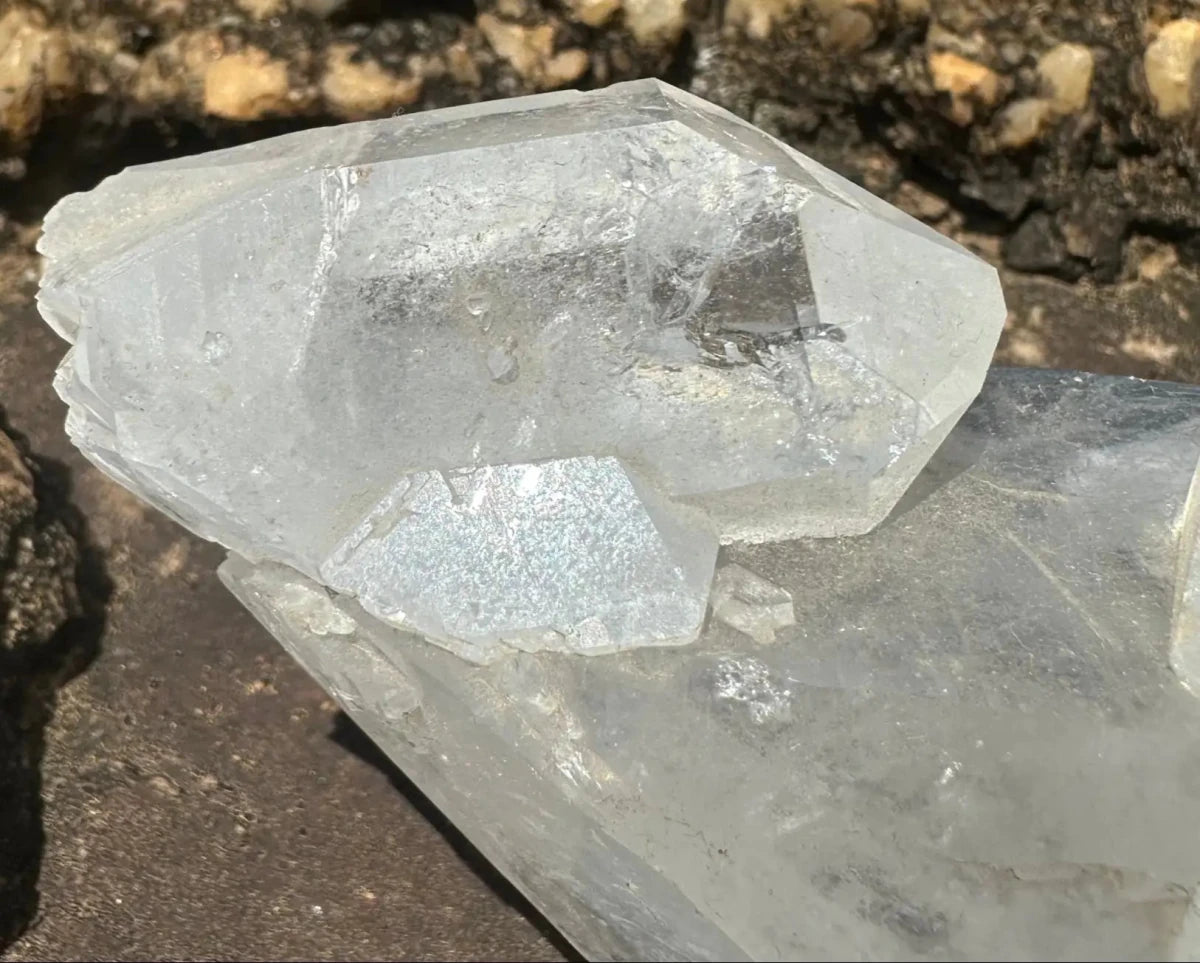 Close Up Of Crystal Point Attached To A Large Thick Quartz Crystal Point