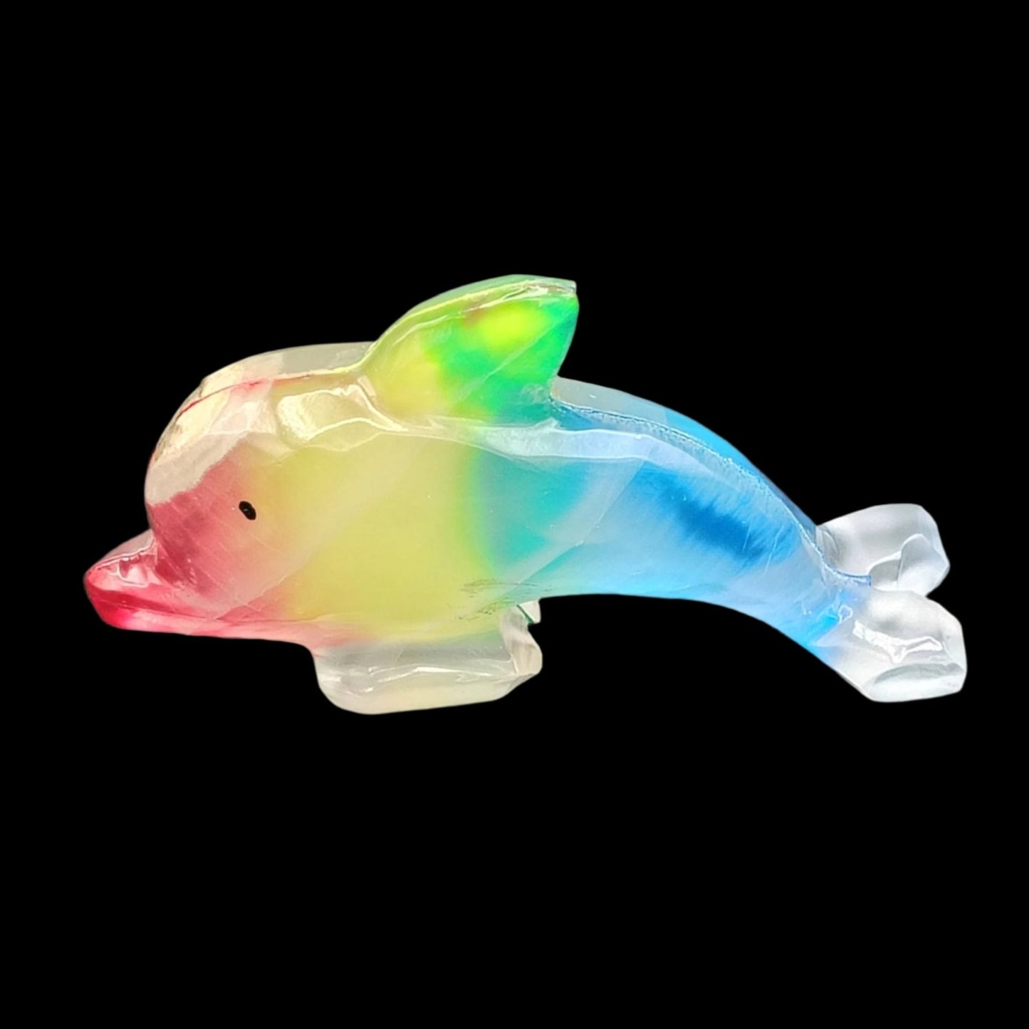 This is the left side of this rainbow Onyx dolphin also in artificial indoor lighting