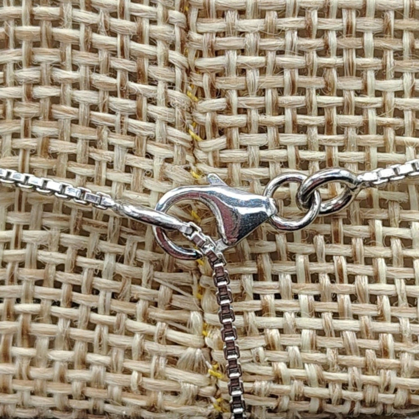 This is a close up of the Sterling Silver lobster claw clasp