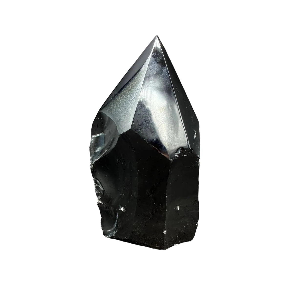 Back side of this black polished Obsidian point, in front of a white background.