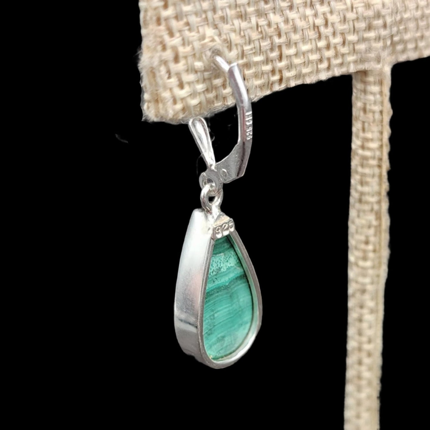 This is a close up of the back of the Malachite gemstones