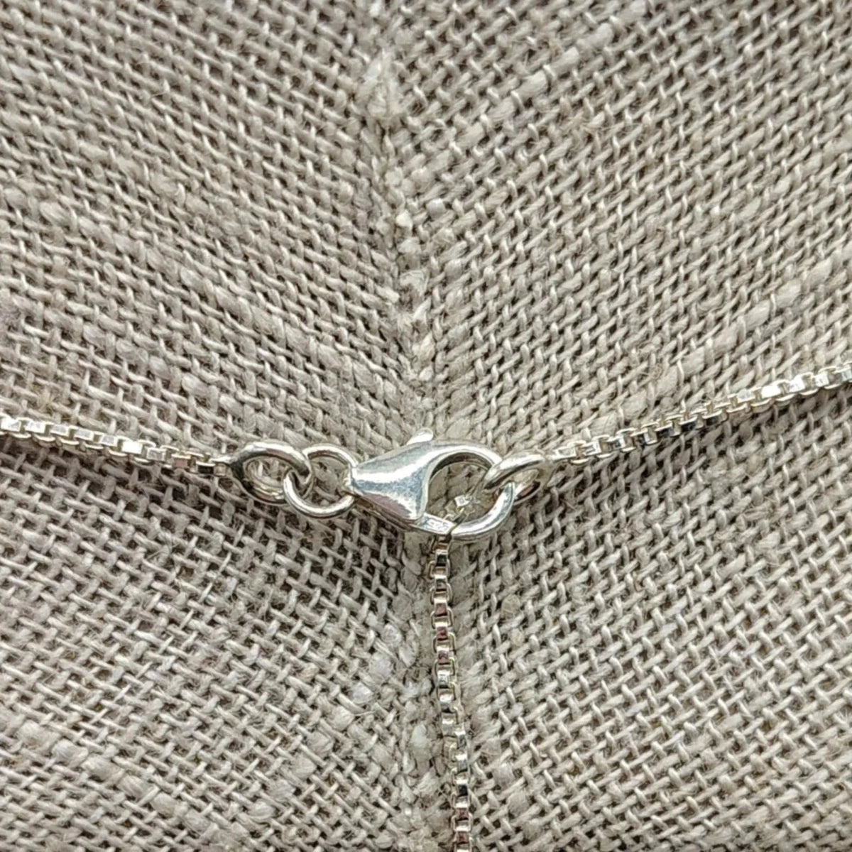 This is a close up of the Sterling Silver lobster claw clasp