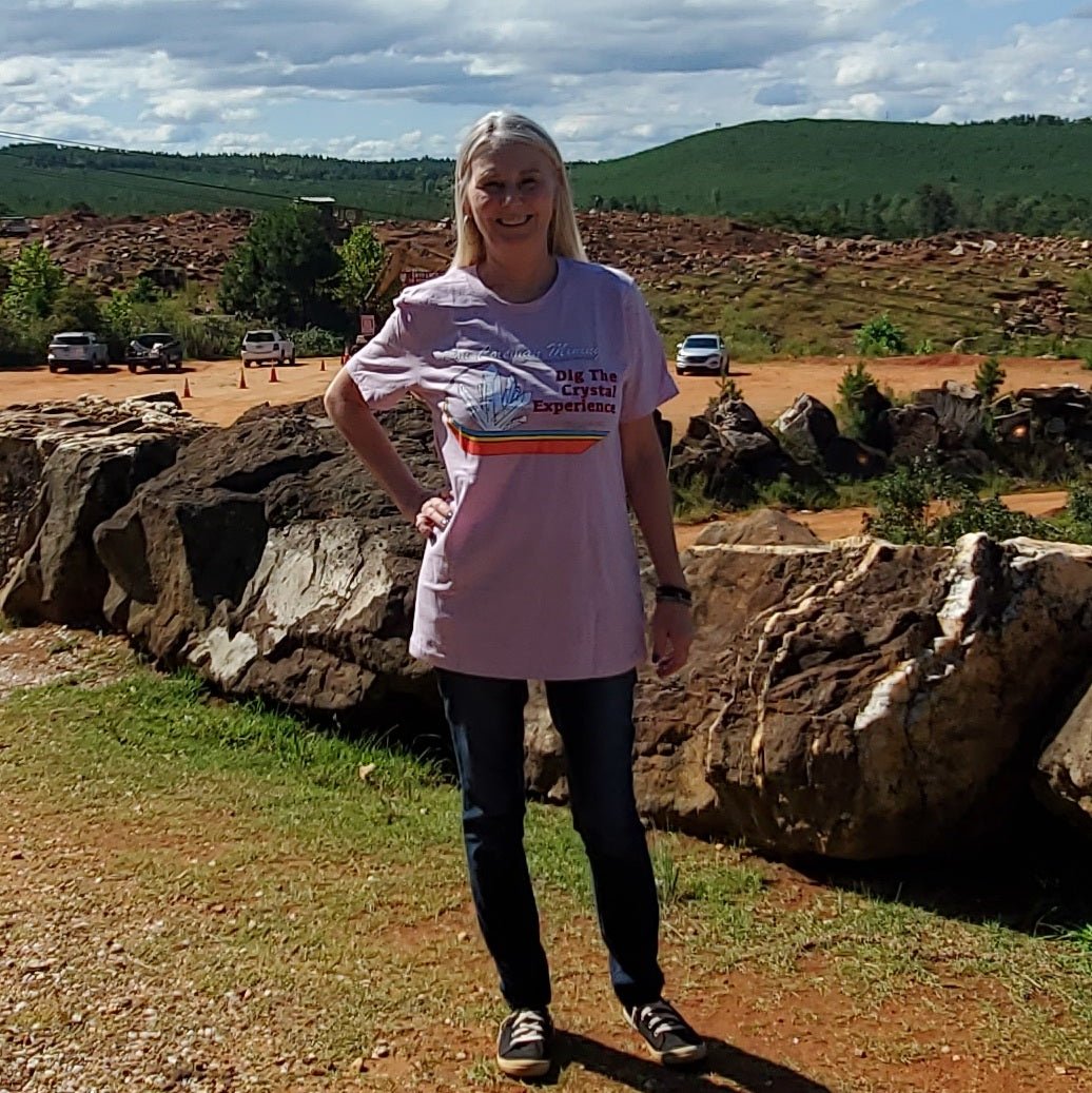 Female wearing Pink Souvenir Ron Coleman Mining T-Shirt