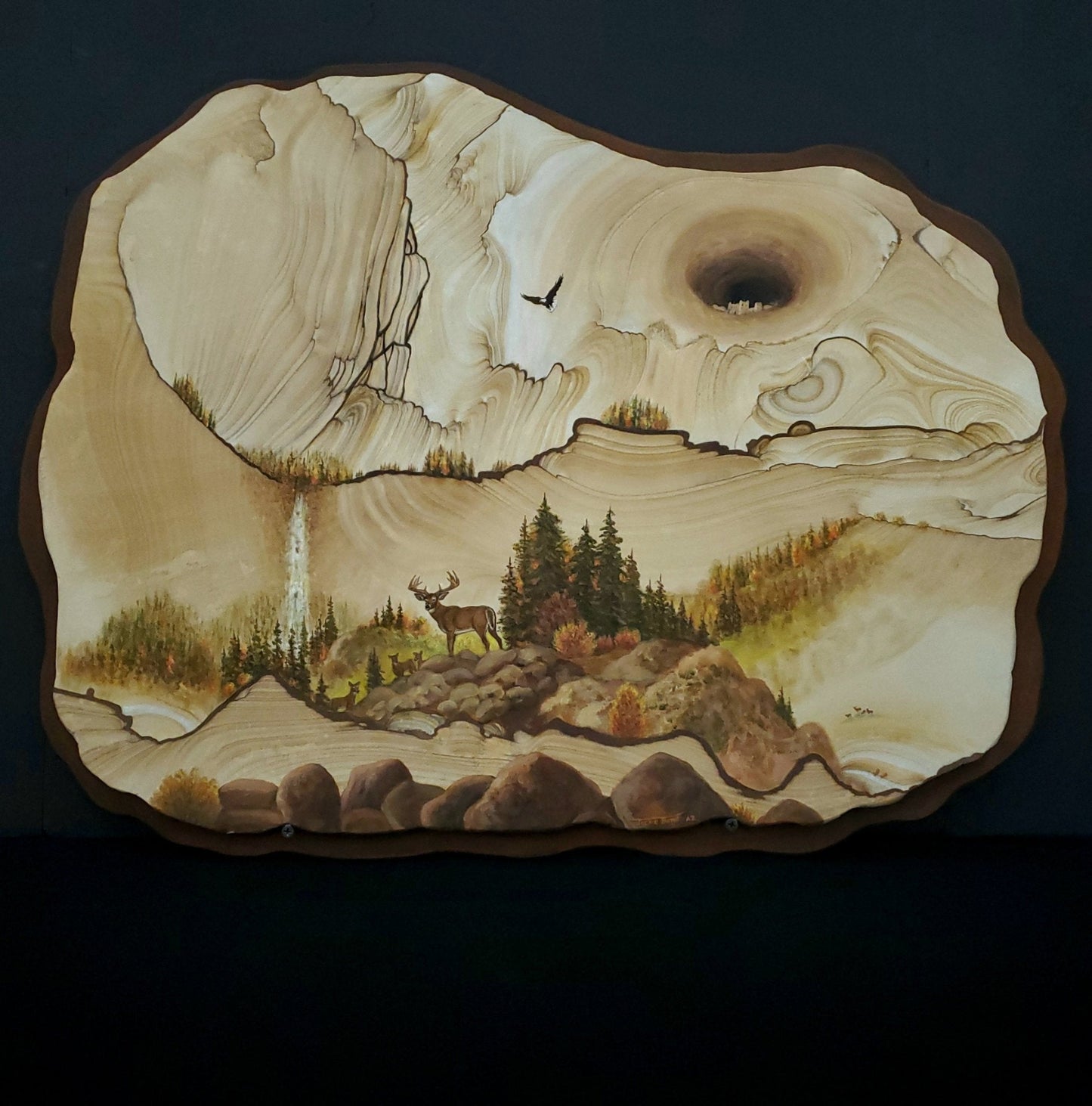 Buck, deer, waterfall, soaring eagle painting on sandstone painting