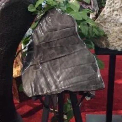 SIlver Sheen Obsidian Slab On A Display Stand
