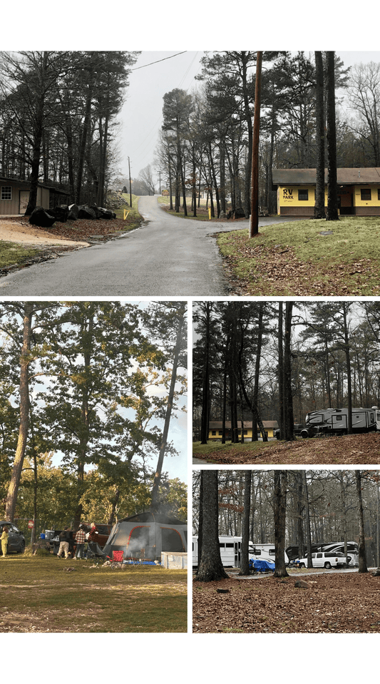 road with yellow building, tents, motorhomes, trees and people