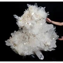 Large Crystal Cluster with female hands touching it