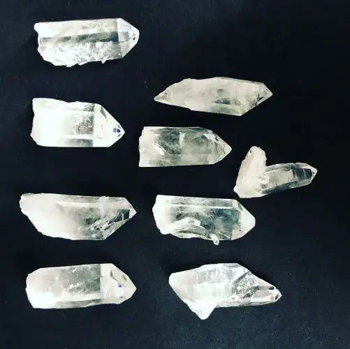 Arkansas Quartz Crystal Points On A Black Background