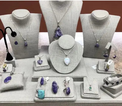 A display of Fashion Jewelry on burlap displays