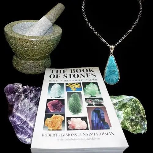 Mortar and pestle, necklace, book, purple stone, green stone