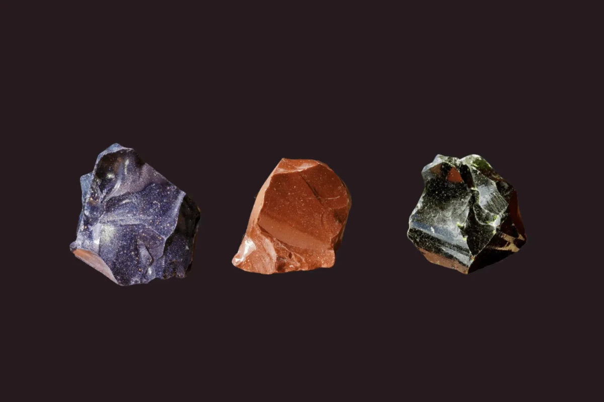 Green Goldstone, Red Goldstone and Blue Goldstone on a black background