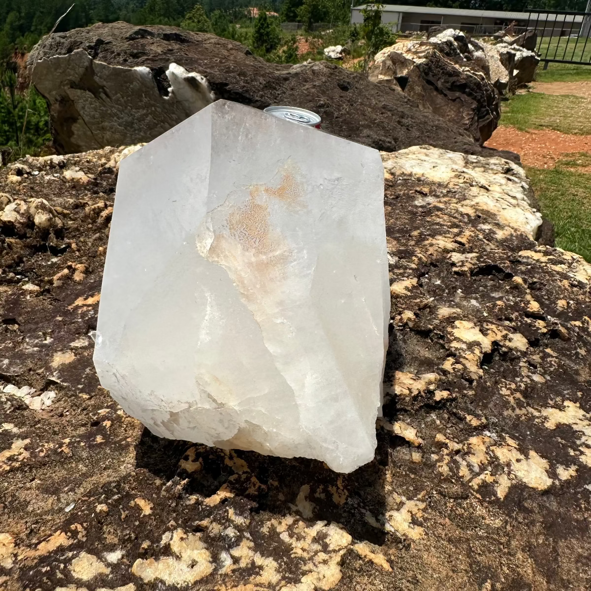Large Self-Healed Crystal Point With Internal Iron Growth On Boulder
