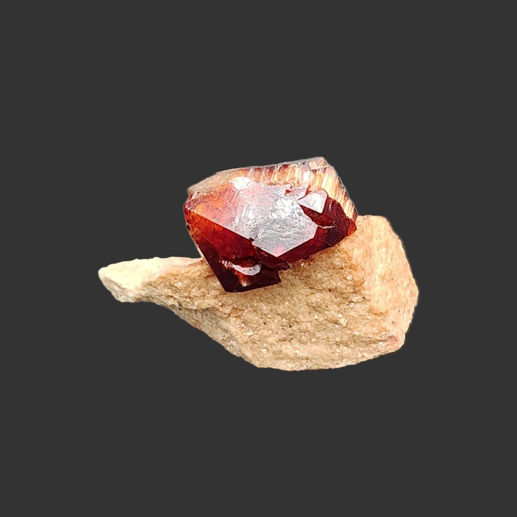 This is the backside and you can also see a little bit of both the brown Arcanite crystal and the tan base.