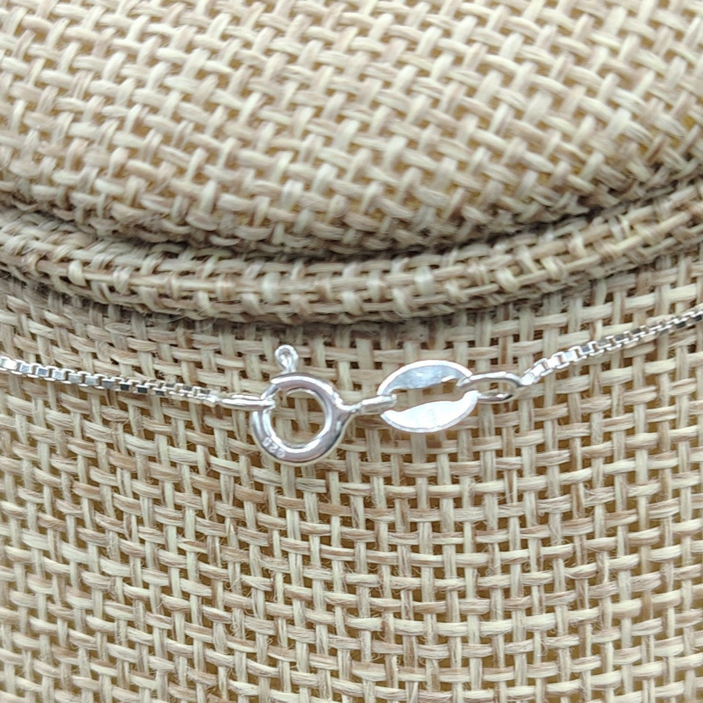 This is a close up of the spring ring clasp on this Sterling Silver chain