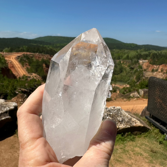 Raw Clear Crystal Point Shown In Natural Sun light with natural beauty