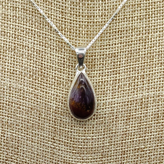 This is a close up of the Sterling Silver Cacoxenite Amethyst pendant