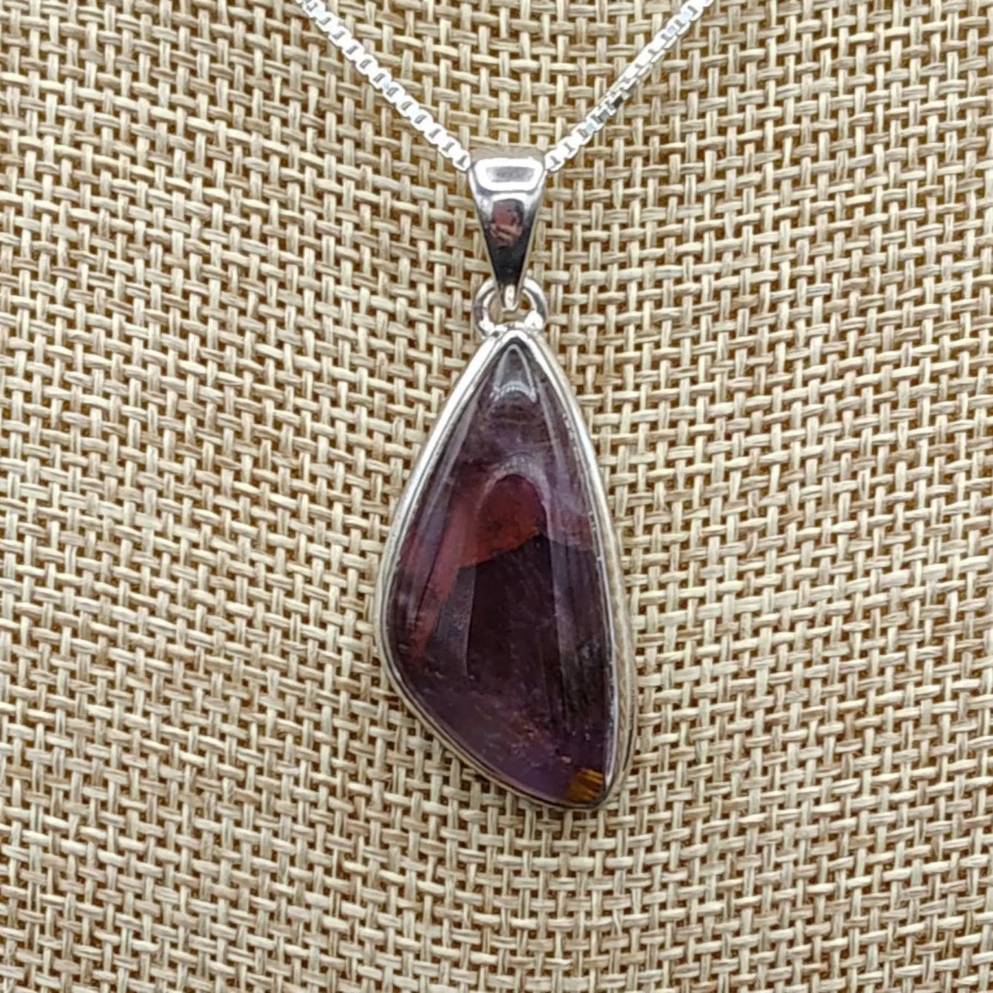 This is a close up of the Cacoxenite Amethyst pendant on this adjustable Sterling Silver chain