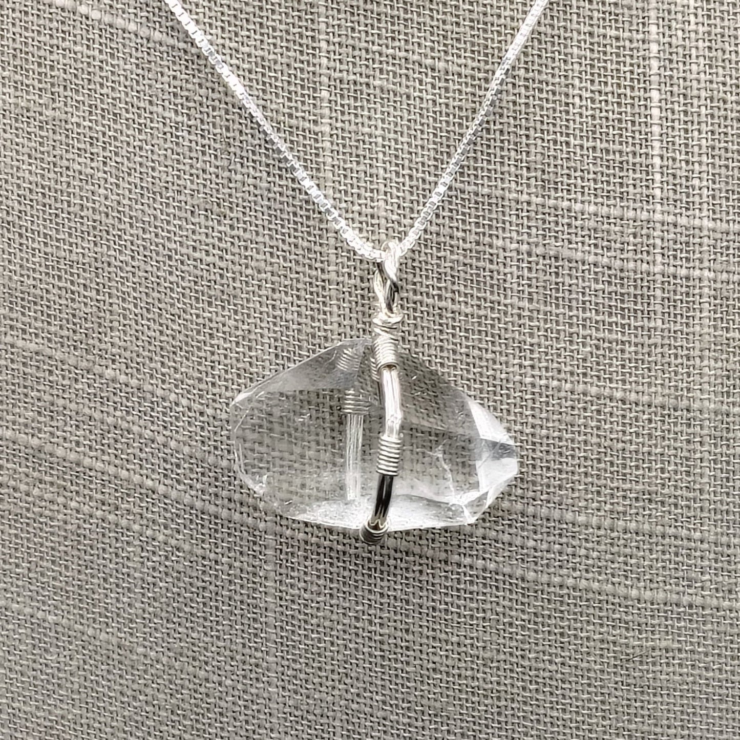 This is a close up of the sterling silver wire wrapped double terminated point