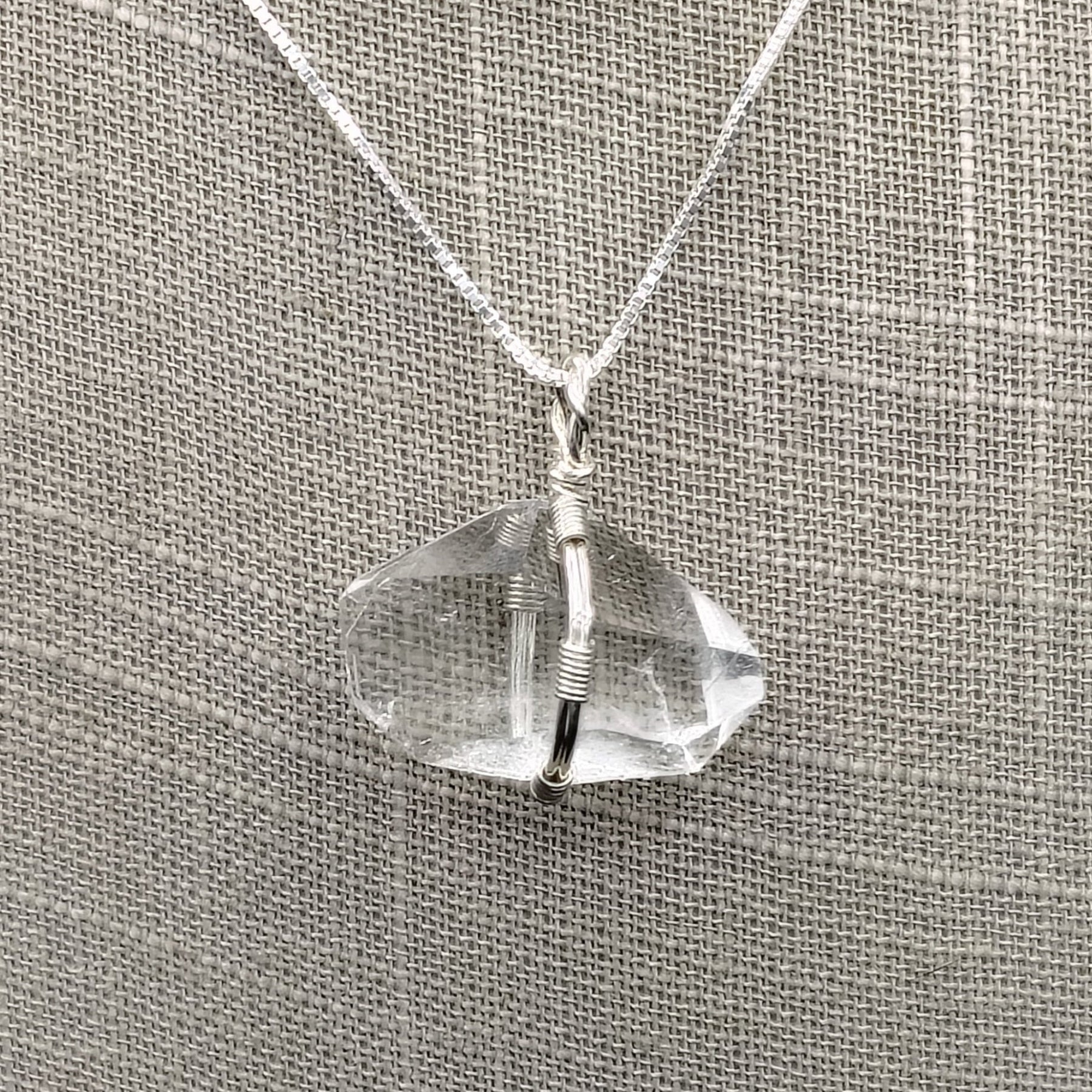 This is a close up of the sterling silver wire wrapped double terminated point