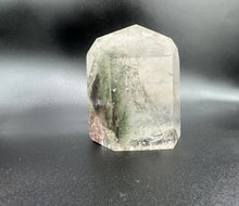Load image into Gallery viewer, Back View Of Chlorite Included Quartz Showing Green Chlorite Within The Mineral.  The bottom is showing a slight fracture within the mineral
