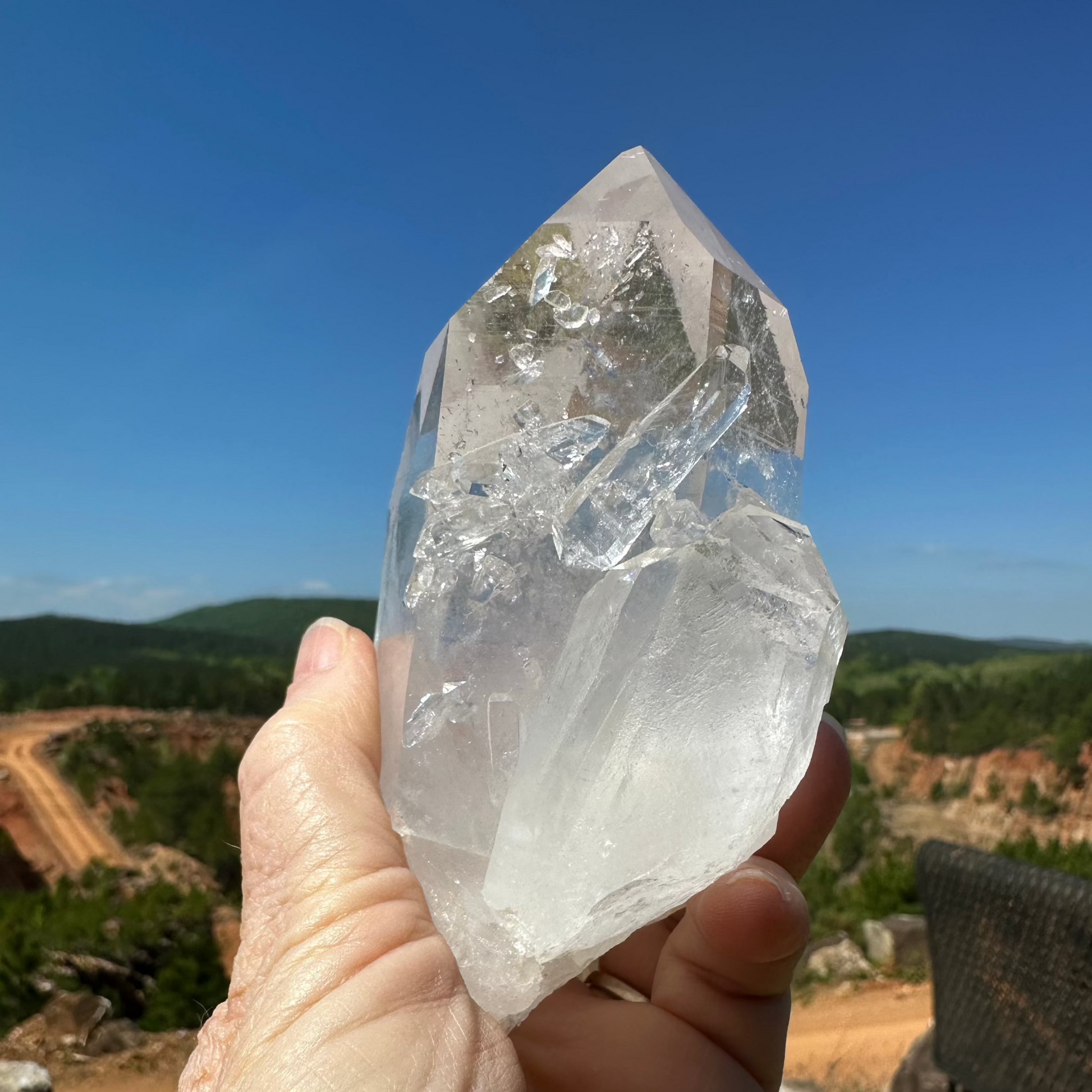 Alternative View Of Clear Crystal Point Shown In Natural Sunlight