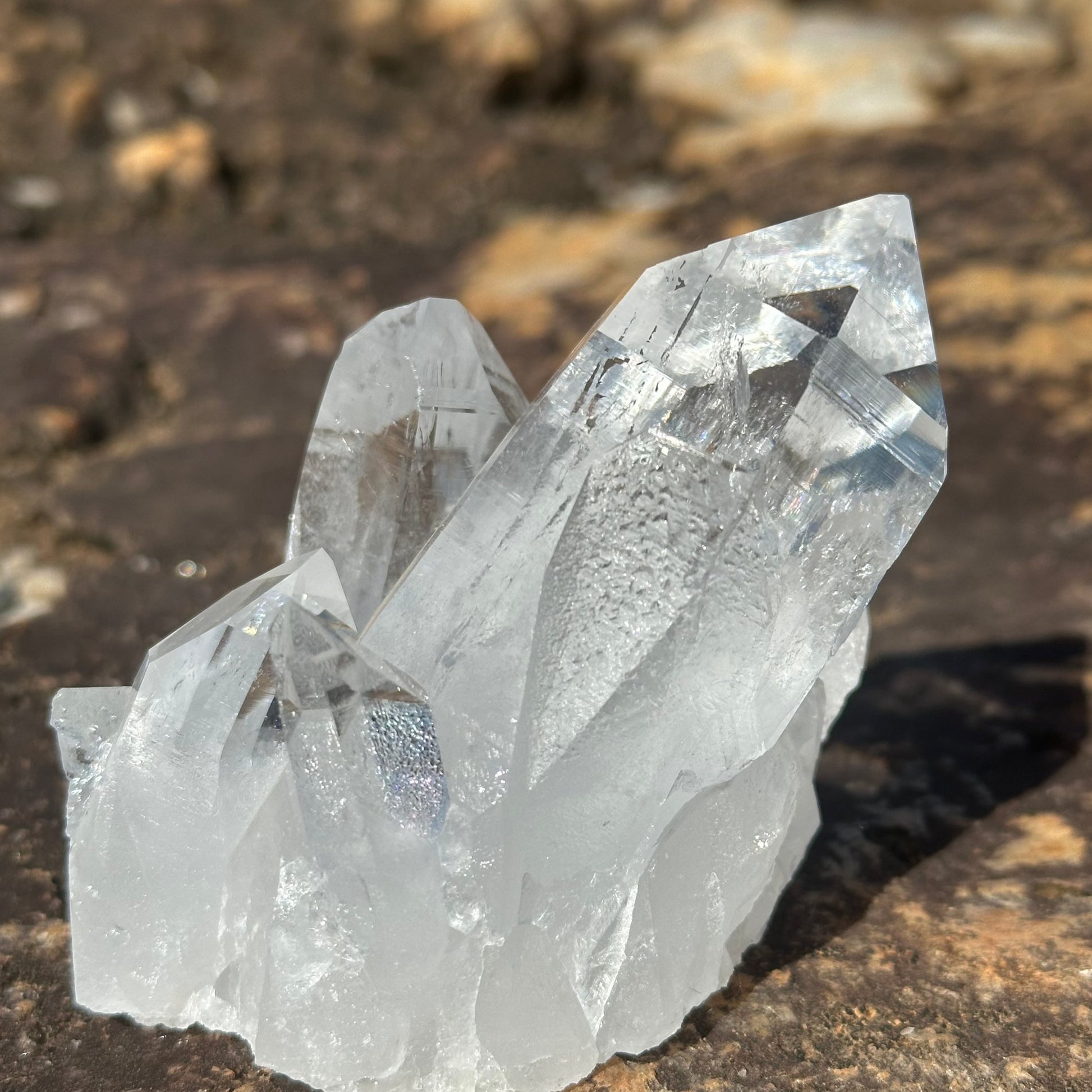 Side View Of Quart Crystal Cluster Sitting On A Bolder At Ron Coleman Mining