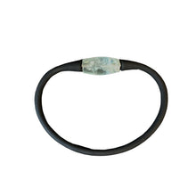 Load image into Gallery viewer, Stretchy Silicone Bracelet With Aquamarine Bead, Band Is Smooth Black And Aqua Bead Is A Translucent Baby Blue
