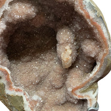 Load image into Gallery viewer, Close Up Of Drusy Geode On Metal Stand, Hundreds Of Pink Drusy Crystals
