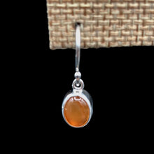 Load image into Gallery viewer, Close Up Of Sterling Silver Carnelian Gemstone Dangle Earrings, Smooth Silver, Oval Shaped And Bright Orange
