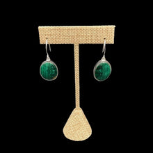Load image into Gallery viewer, Sterling Silver And Malachite Gemstone Dangle Earrings, The Hardware Is Polished Silver And The Gemstones Are Oval Shaped And Is A Wavy Pattern Of dark And Light Green
