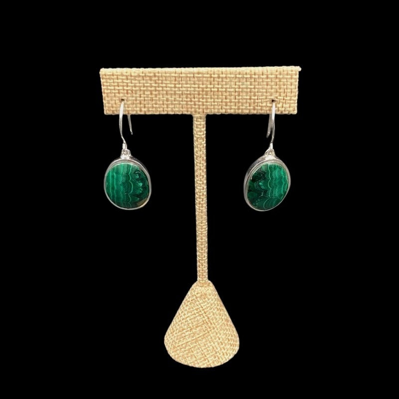 Sterling Silver And Malachite Gemstone Dangle Earrings, The Hardware Is Polished Silver And The Gemstones Are Oval Shaped And Is A Wavy Pattern Of dark And Light Green