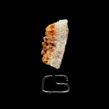 Load image into Gallery viewer, Side View Of Citrine Druse On Stand, Honey Colored And White Druse Crystals And Black Metal Stand
