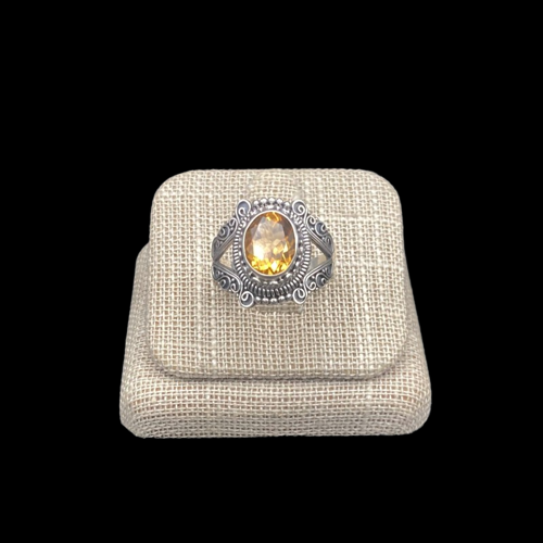 Front View Womens Sterling Silver Ring With Oval Shaped Citrine Gemstone Ring, Gemstone Is A Beautiful Golden Yellow And The Setting Is A Detailed Rope Like Design