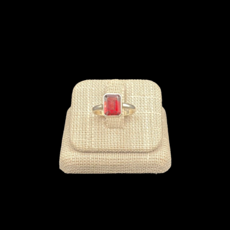 Front View Of Sterling Silver Garnet Gemstone Ring, Gemstone Is Rectangular And Bright Red