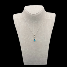 Load image into Gallery viewer, Sterling Silver Cat And Blue Topaz Gemstone Necklace, Gemstone Is A Bright Ocean Blue Color And Above It Is A Small Cat Pendant
